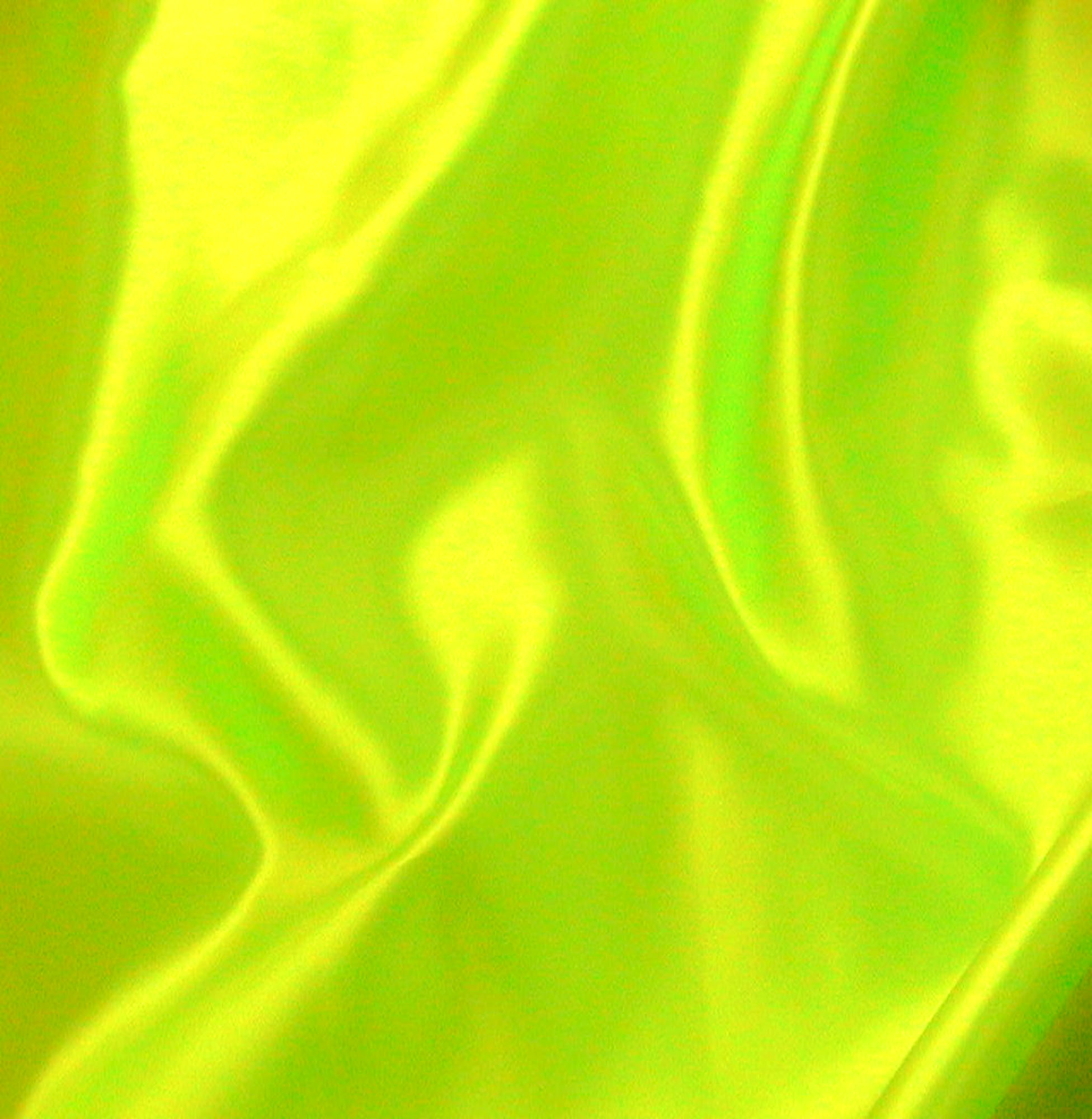 Fabrics Acetate Satin Flo Yellow. 112 cm wide. Sold by the 23 mtr roll.